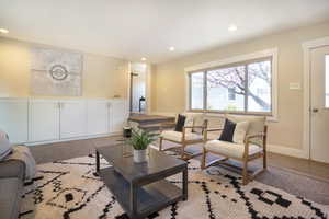 Living area featuring recessed lighting and light wood-type flooring