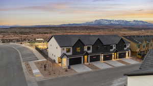 Drone / aerial view featuring a residential view and a mountain view