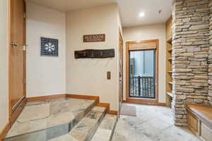 Entryway featuring baseboards