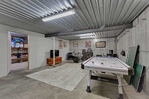 Playroom featuring concrete floors