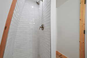 Bathroom with tiled shower