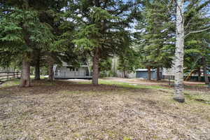 View of yard with fence