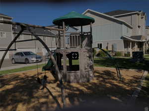 Communal playground with a residential view. Townhome 3rd from the end.