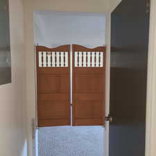 Swinging doors into lower level family room