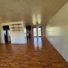 Family Room/Dining Room on upper level with laminate wood flooring