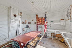 Interior space with concrete flooring and a workshop area