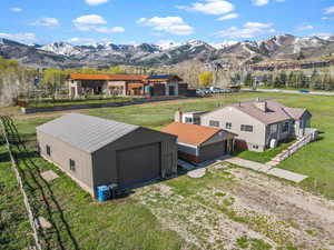 Birds eye view of property featuring a mountain view