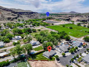 Birds eye view of property with a mountain view