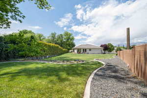 View of yard with fence
