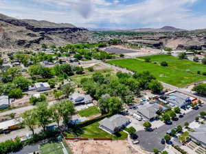 Birds eye view of property with a mountain view