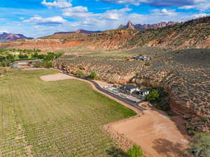 Birds eye view of property featuring a mountain view and a rural view