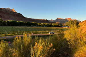 Property view of mountains with a rural view
