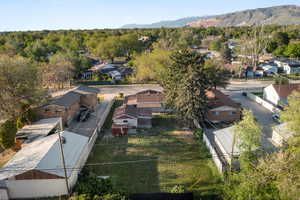 Birds eye view of property featuring a residential view and a mountain view