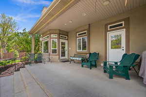View of patio with fence