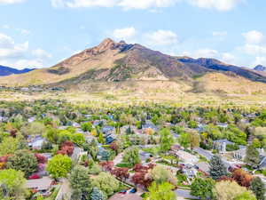 Drone / aerial view featuring a mountain view and a residential view