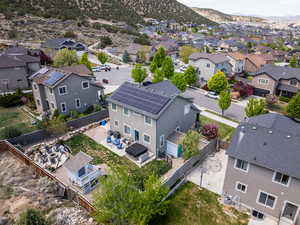 Drone / aerial view featuring a mountain view and a residential view