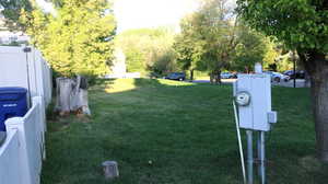 View of yard with fence