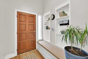 Entrance foyer with built in shelving