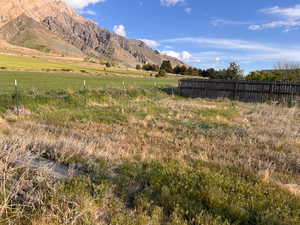 View of mountain feature with a rural view