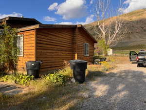 View of property exterior with a mountain view