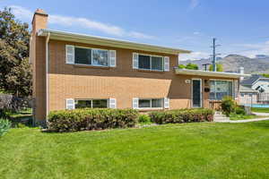 Mid Century Tri-Level home with a mountain view to the East