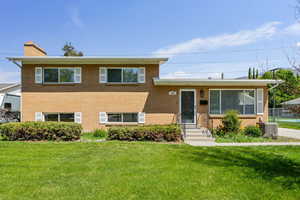 Mid Century Tri-Level home with a mountain view to the East