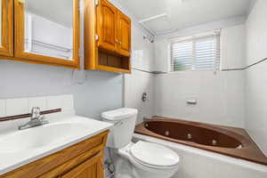 Full bathroom featuring  a combined bath / shower with jetted tub