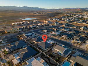 Drone / aerial view with a residential view and a mountain view