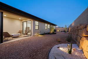 View of yard with a patio and a fenced backyard
