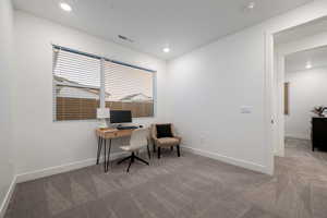 Office with baseboards, carpet flooring, recessed lighting, and visible vents