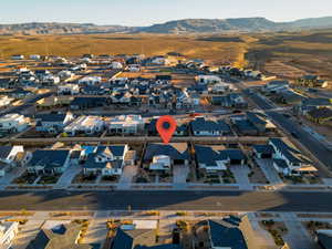 Drone / aerial view with a residential view and a mountain view
