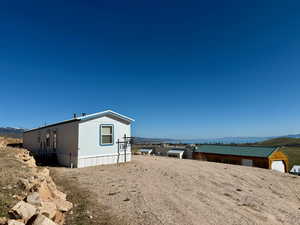 Exterior space featuring a mountain view