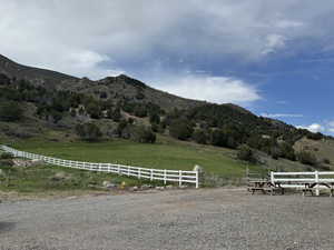 View of mountain background featuring rural landscape and agricultural land
