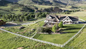 Drone / aerial view featuring a mountain view and a rural view