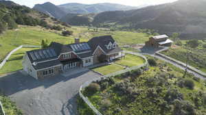Aerial view with a rural view and a mountain view
