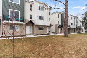 View of front of house with a front lawn