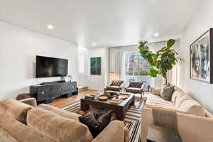Living room featuring recessed lighting and wood finished floors