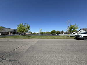View of road with curbs and sidewalks