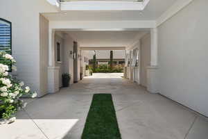 Corridor featuring decorative columns