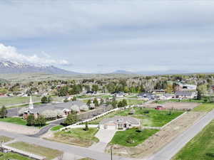 Aerial view featuring a mountain view and a residential view