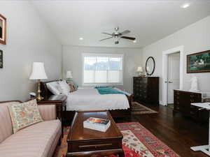 Primary Bedroom with recessed lighting, a ceiling fan, dark wood-style flooring, and baseboards