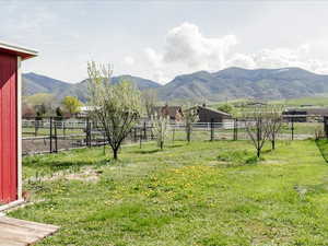 Property view of mountains featuring a rural view