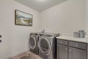 Laundry room with new washer and dryer.