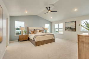 Primary Bedroom with vaulted ceiling, a ceiling fan, and recessed lighting