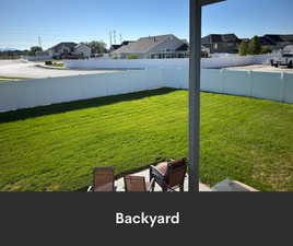 View of yard featuring a residential view