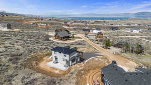 Aerial view featuring a water and mountain view