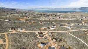 Bird's eye view featuring a water and mountain view
