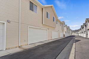 Exterior space with community garages and a residential view