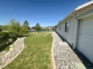 View of yard with fence