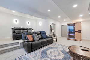 Theater room area featuring infrared sauna recessed lighting, baseboards, and light colored carpet